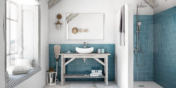 Blue tile backsplash and shower in bathroom remodel