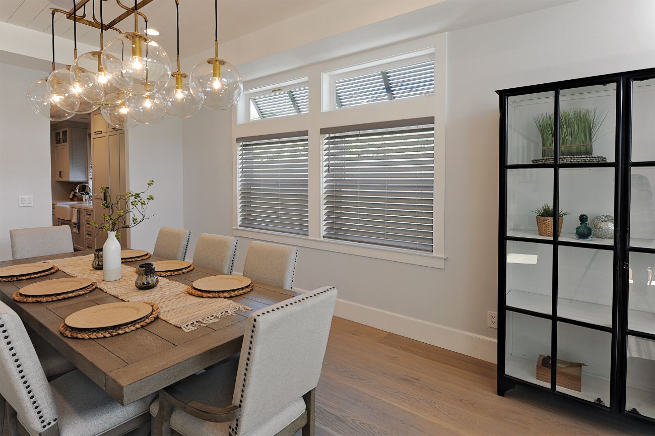 Dining room with blinds on windows
