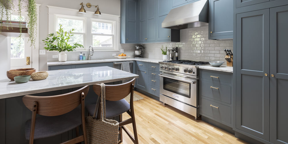 Blue kitchen with white tile backsplash | Classique floors + tile
