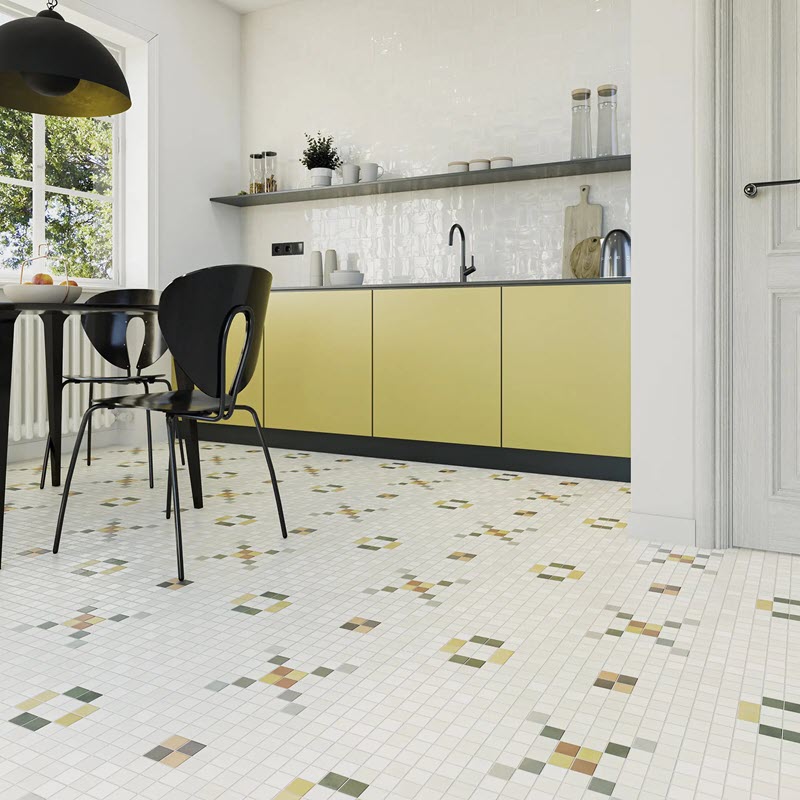 The pattern in the floor results from alternating small square tiles of different colors.