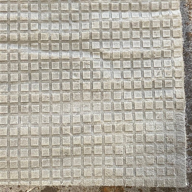 Synthetic felt padding for area rugs